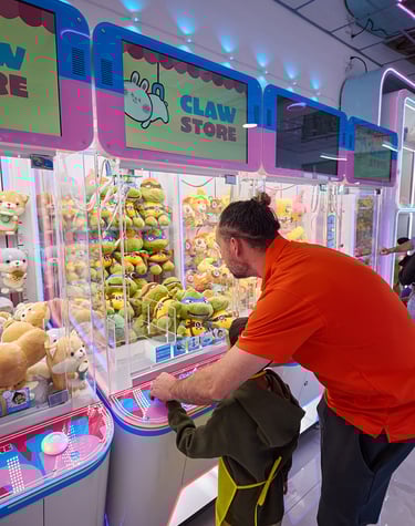 Playing arcade claw machines