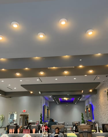 <img src="restaurant-interior.jpg" alt="Restaurant dining room renovation featuring new flooring and lighting installation">