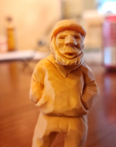 Carved from basswood, old dock yard worker man 2" high.  carved by James Smith