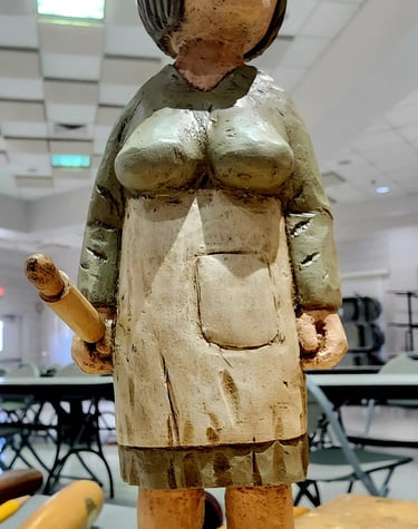 Hillbilly Cleaning  Lady carved by Ron Gonyea 