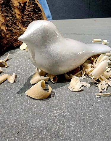 comfort bird hand carved by Tom Anstett