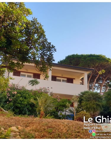 house with a large balcony on Elba Island