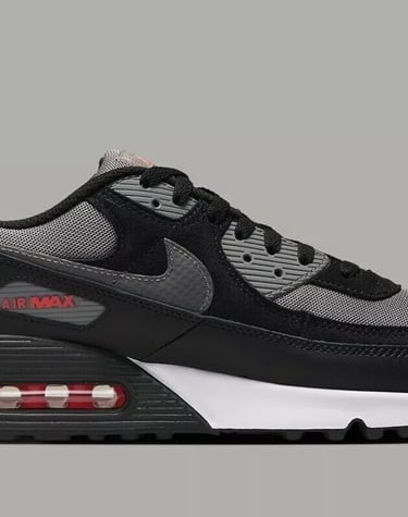 Nike Air Max 90 sneakers in Black, Pewter Gray, and University Red colorway with visible Air cushioning