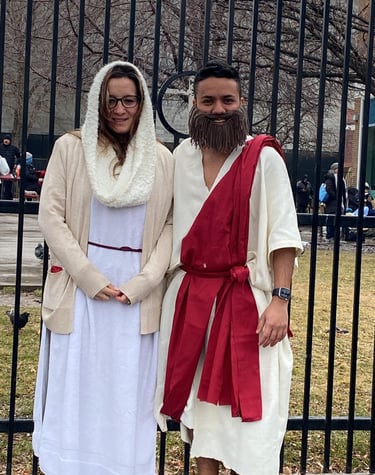 A man and woman in biblical costumes for a live nativity or religious reenactment.