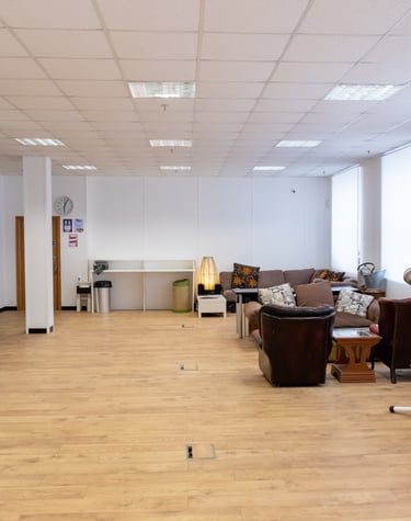 The White Room at Atlas Studios. Image showing laminate flooring, clean white walls and furniture.