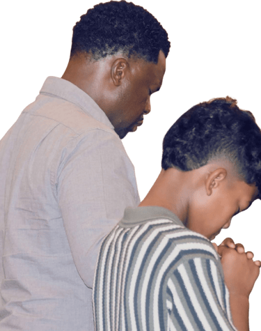 Father & son bowing their head to pray