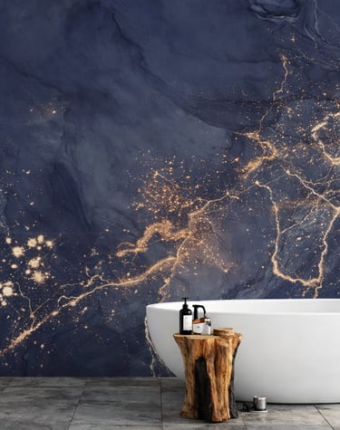 Modern bathroom featuring a white oval bathtub against a navy blue marble wallpaper with gold glitter accents.