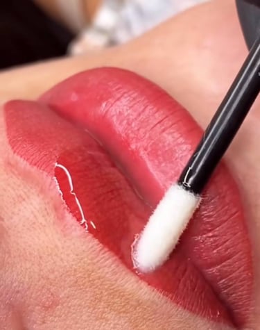 Permanent lip blush treatment being applied at Glam S Beauty.
