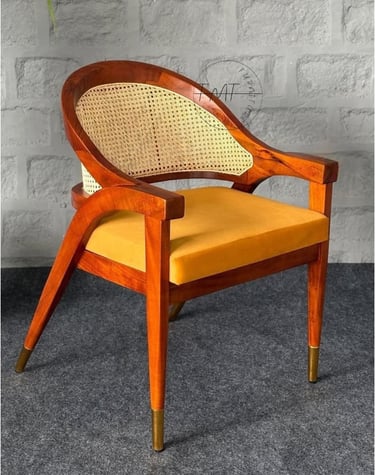 a chair with a yellow cushion and a chair with a yellow cushion