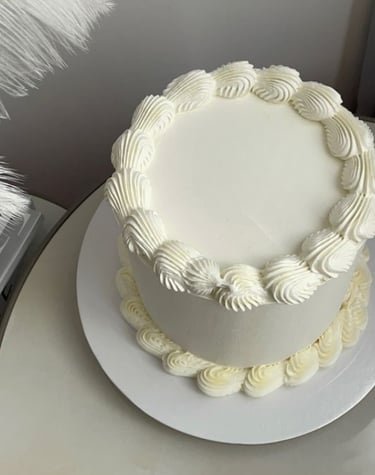 top and bottom border vegan vanilla cake with vanilla frosting