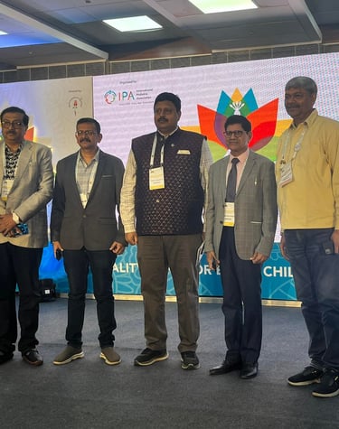 a group of men standing in front of a stage. Rini Hospital Dholpur