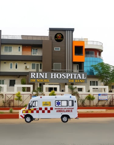 Rini Hospital Dholpur -a van parked in front of a hospital