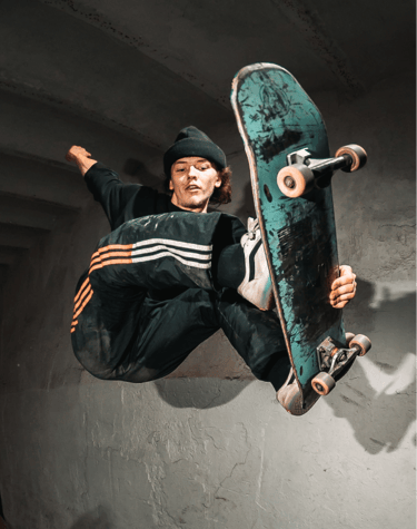 a man in a black shirt is doing a trick on a skateboard