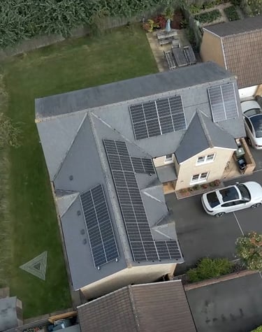 a house with solar panels installed on a roof