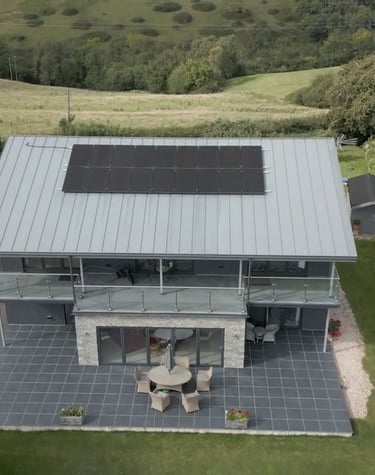 a house with solar panels on the roof 