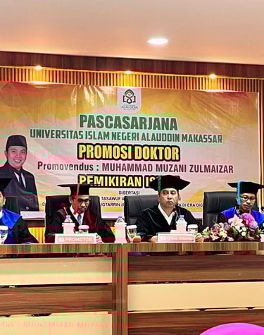 a group of people sitting at a table with a banner on it