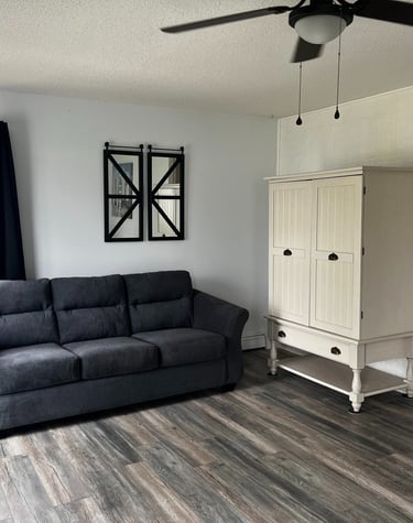 living room lakeside fireplace lake views southern michigan vrbo airbnb dock short term rental