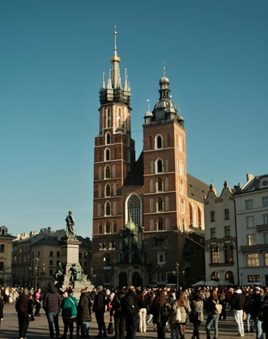 St. Mary’s Basilica and Main Market Square in Krakow, Poland with historic architecture