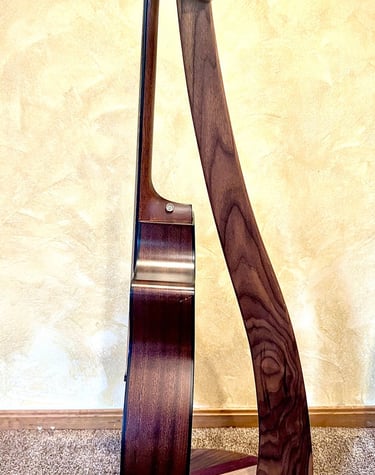 One-of-a-kind knock-down guitar stand made from black walnut, maple, and purple heart.