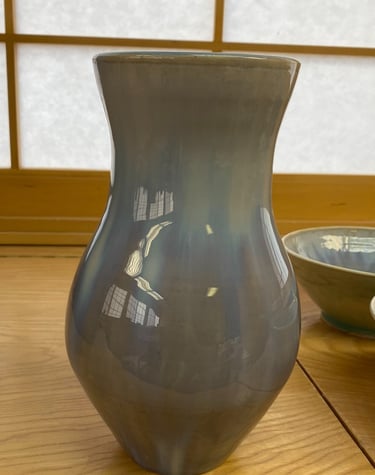 A blue and grey ceramic vase