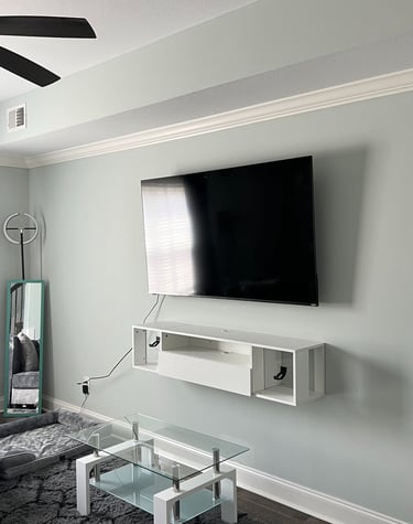 Basic TV install with decorative floating shelf underneath