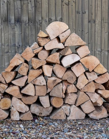 Loose load 1m3 kiln dried logs stacked by Ouse Firewood