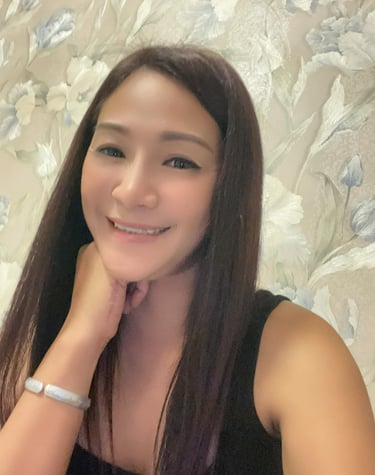 Lady therapist with hand on chin 