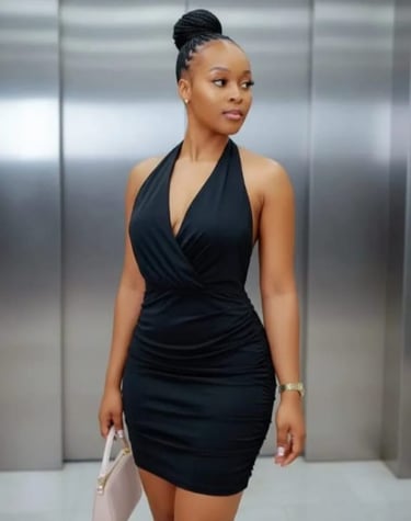 Elegantly dressed home massage therapist