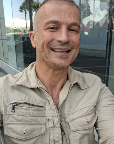 Male therapist wearing beige coloured jacket