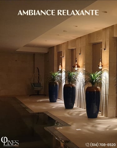 a hotel lobby with a large vase of plants
