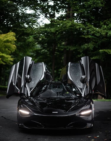 A Mclaren 720s with the doors open.
