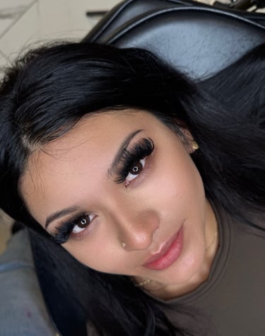 A woman with new Eyelash Service