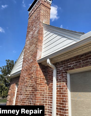 A refurbished chimney area with watertight seal and chimney cap