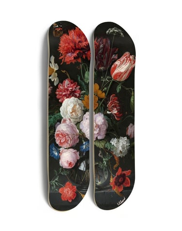 two skateboards with flowers on them on a white background