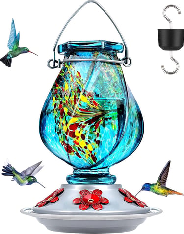 Hand-blown blue glass hummingbird feeder with colorful accents and red flower feeding ports.