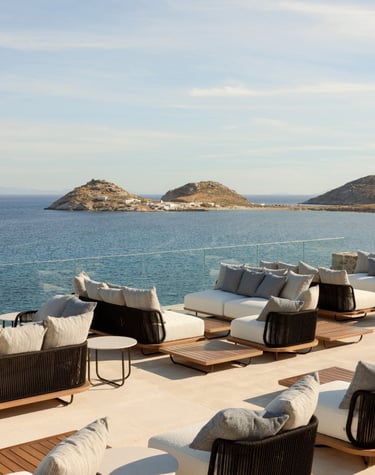 a lounge area with couches and chairs