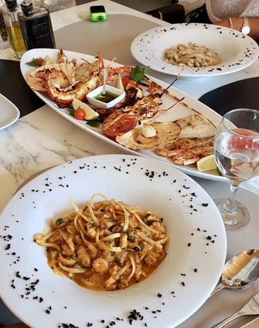 Fresh seafood platter with shrimps at Nevera restaurant on the island of Solta during boat trip from Split.