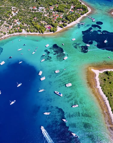 Aerial panoramic view of Blue Lagoon at Drvenik Veliki Island, seen on a private boat tour from Split, Croatia.