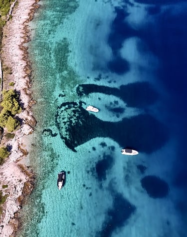 Aerial panoramic view of Drvenik Mali Island, seen on a private boat tour off the coast of Split, Croatia.