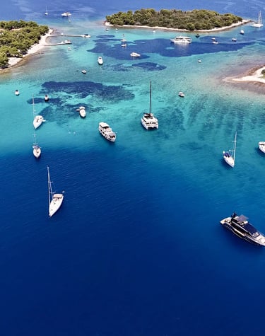Aerial panoramic view of Blue Lagoon at Drvenik Veliki Island, seen on a private boat tour from Split, Croatia.