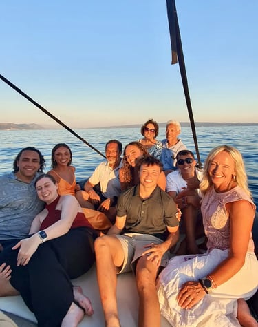 Big family smiling and enjoying a private sunset boat tour from Split, Croatia with SunMarine