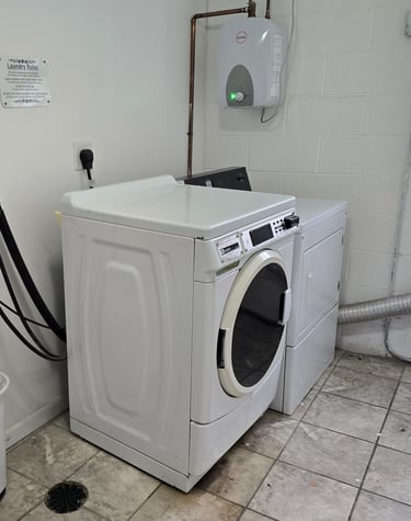 New card operated washers and dryers in every building.