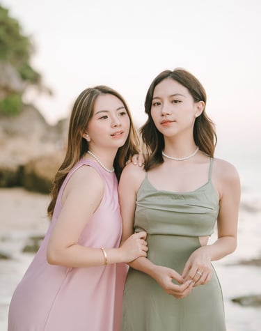 Portrait of two friends standing together during photoshoot at Geger Beach Nusa Dua Bali