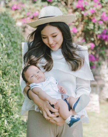 mother and baby portrait at Samabe Bali resort garden