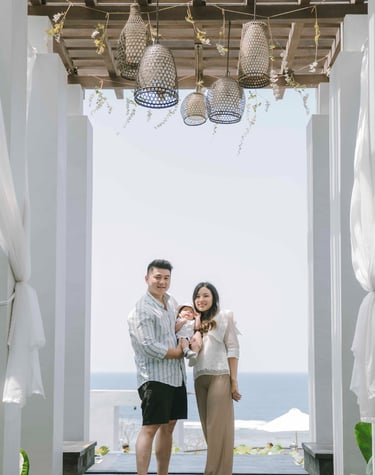 family photography session at Samabe Bali with ocean view backdrop