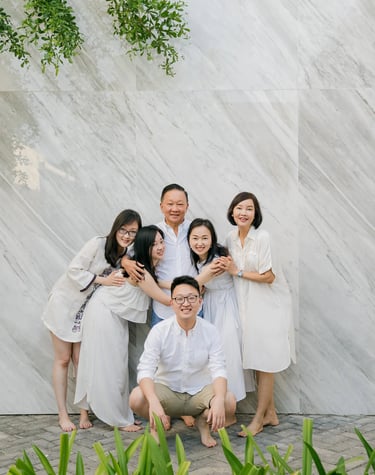 Stefy family portrait beside modern architecture at Renaissance Uluwatu Bali