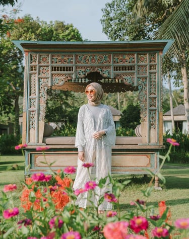 Portrait of woman standing near garden pavilion at Candi Beach Resort Karangasem Bali