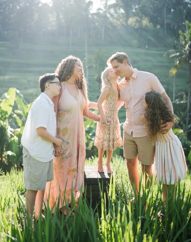 Couple portrait in the rice fields during a family photography session in Tegalalang Bali
