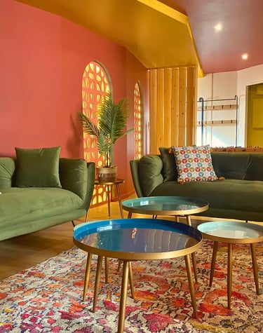 Friendly lounge with sofas and coffee tables for professional accommodation in Saint-Omer