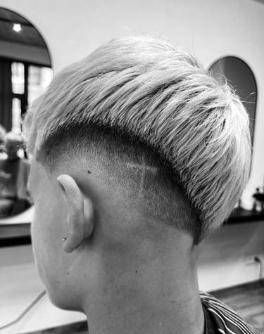 a man with a shaved undercut and a shaved undercut